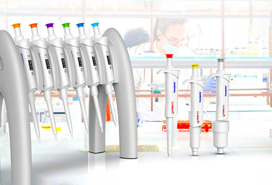 White pipette rack holding various Four E's USA lab pipettes.