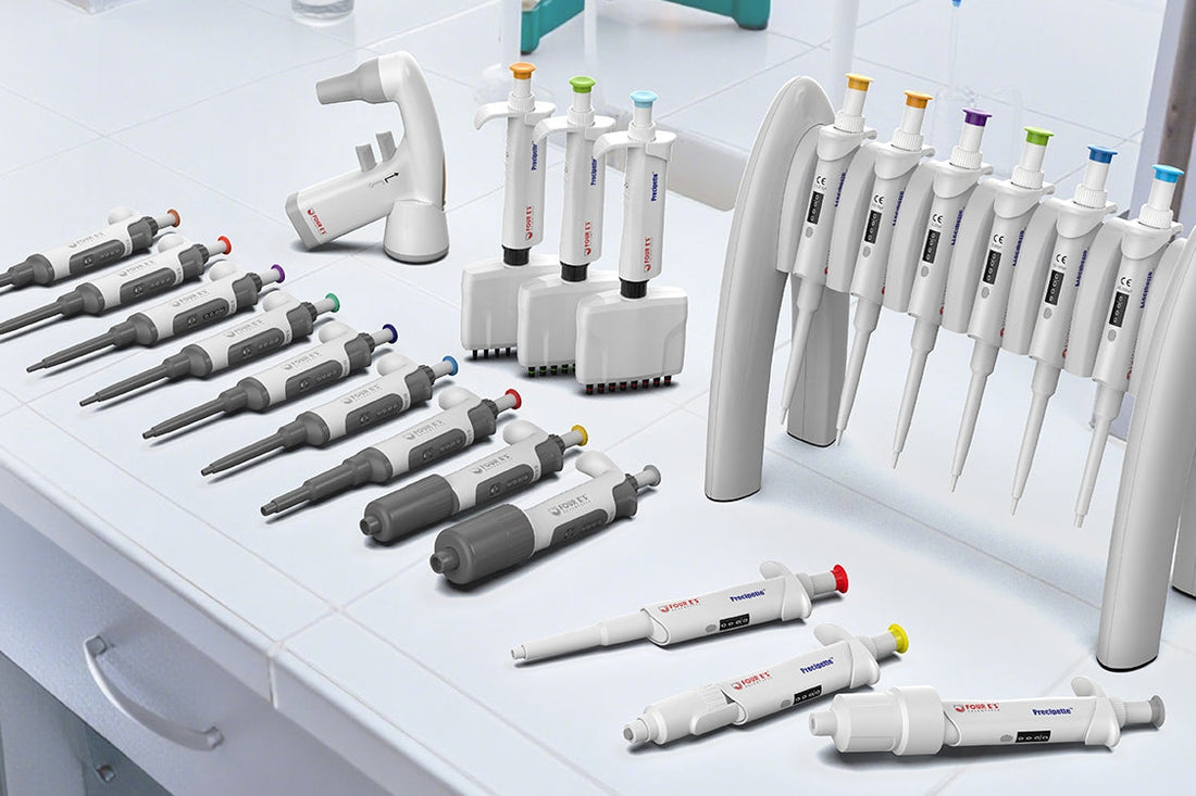 Lab table with pipettes, pipette stand, and electronic pipette filler from Four E's USA.